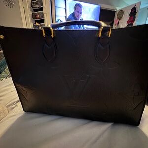 Beautiful black bag.  Faux